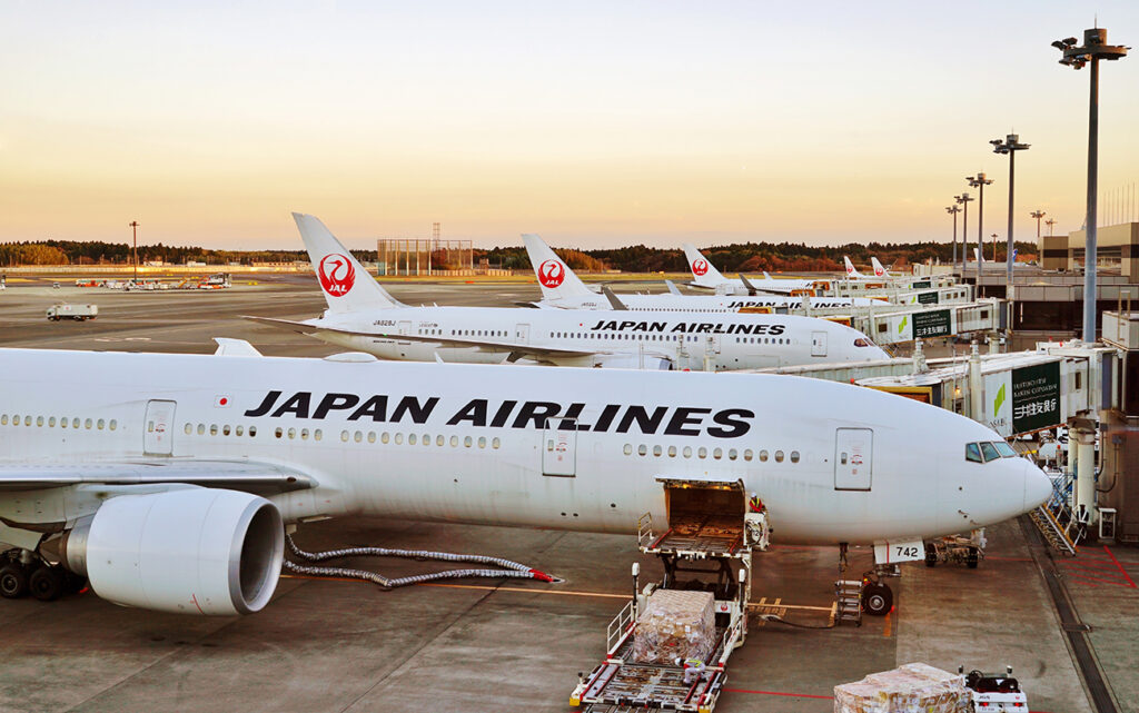 NARITA, JAPAN -6 DEC 2016- Planes from Japan Airlines (JL) at the Tokyo Narita Airport (NRT). Narita is a hub for Japan Airlines (JL) and All Nippon Airlines ANA (NH).